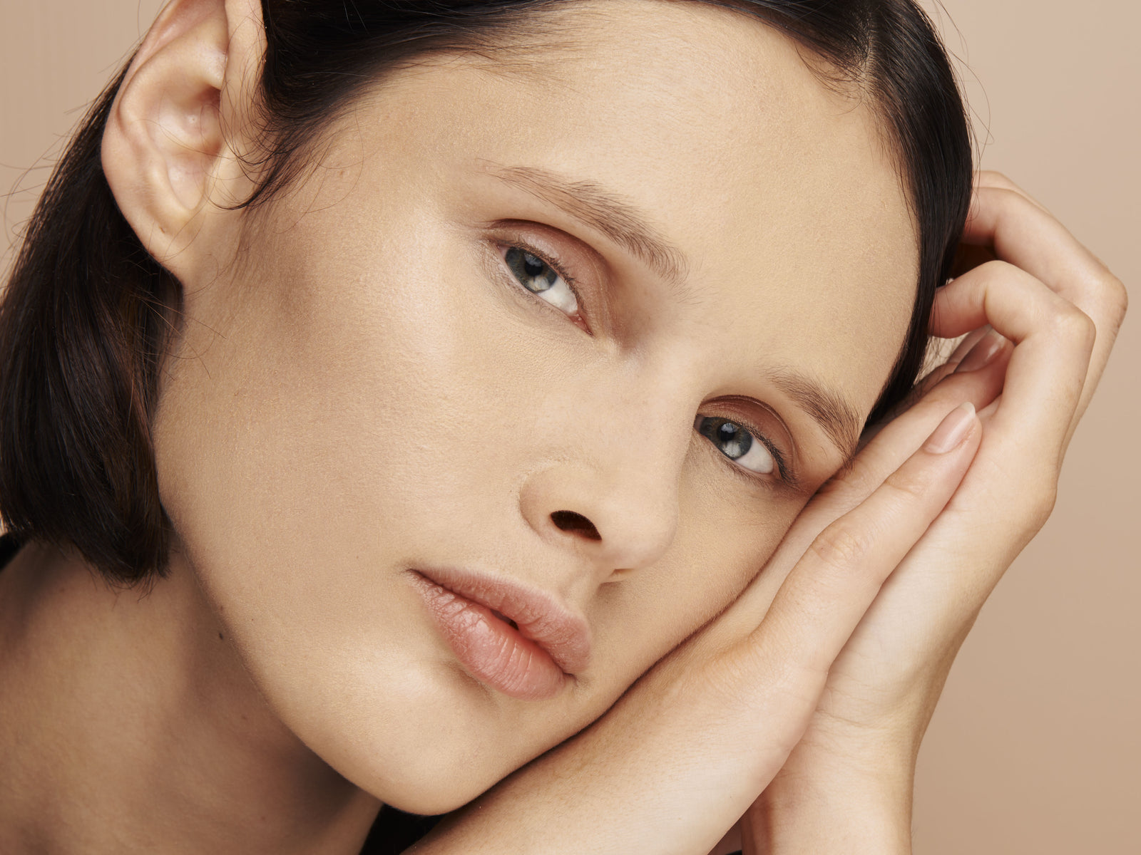 woman with a healthy, glowing complexion 