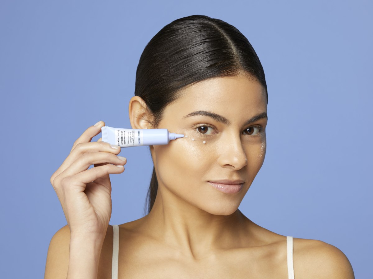 woman using comfort zone eye cream